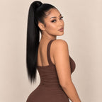 Model wearing a jet black ponytail extension