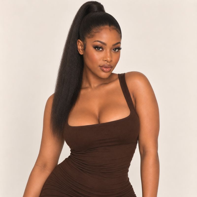 Model wearing a kinky straight ponytail extension