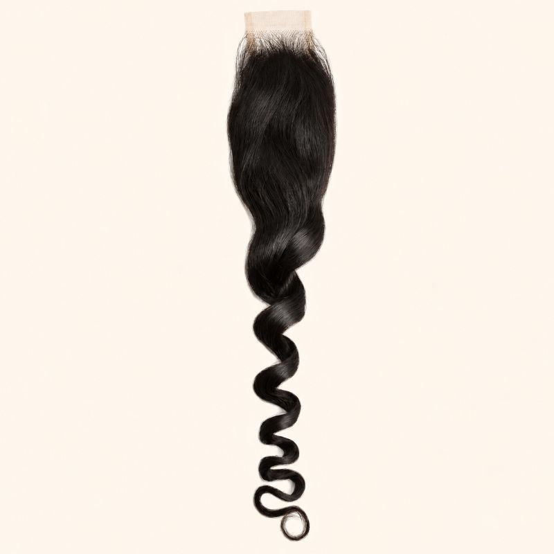 Loose wave 2x6 HD lace closure in natural black, laid flat showing the full hair length