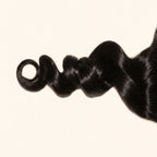 Close-up of the loose wave texture on a 6x6 HD lace closure