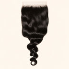 Loose wave 6x6 HD lace closure in natural black, laid flat showing the full hair length