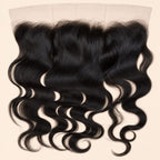 Raw body wave 13x4 HD lace frontal in natural black, laid flat showing the full ear-to-ear lace