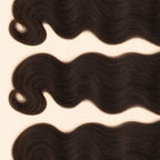 Three raw Indian wavy wefts laid flat, showing the staggered lengths