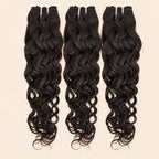 Three Spanish wave human hair bundles standing side by side