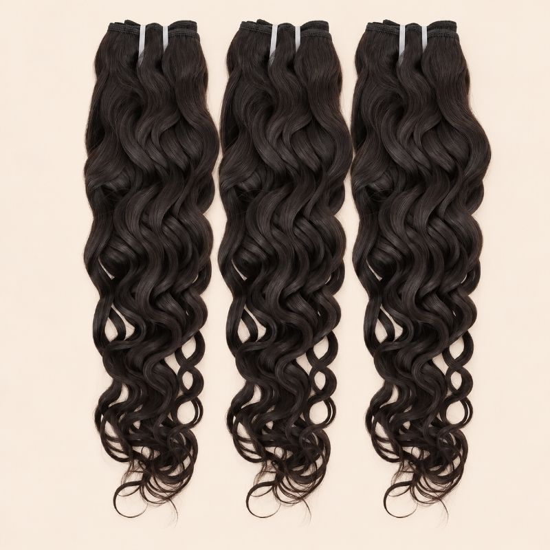 Three Spanish wave human hair bundles standing side by side