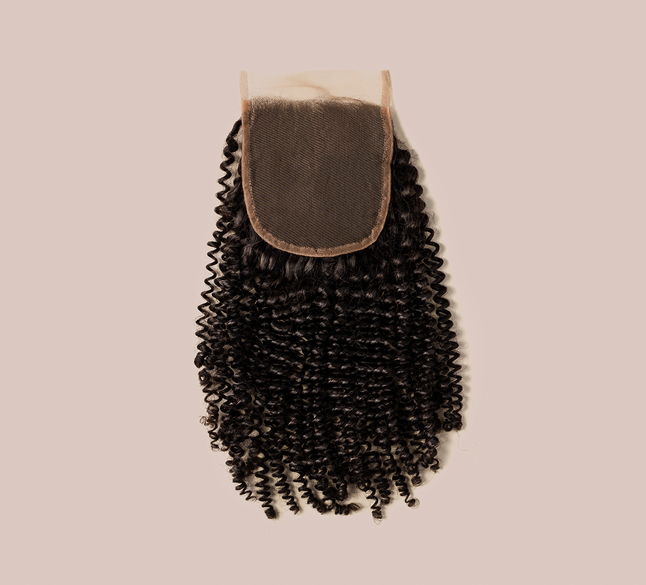 Color swatch of natural black virgin Brazilian curly 4x4 closure hair