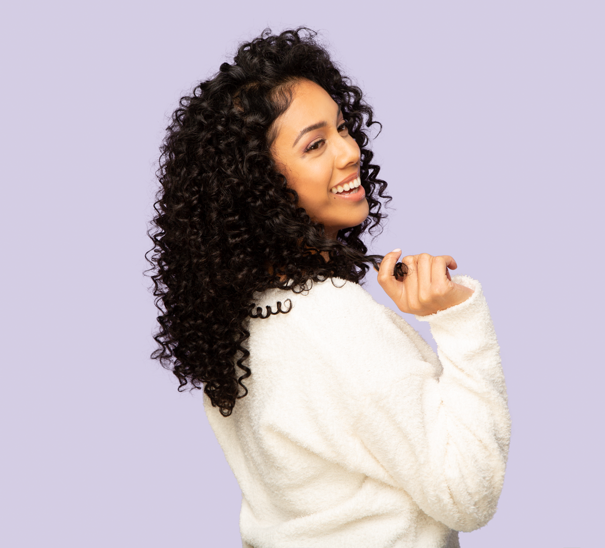 Close-up of the deep wave curl pattern on virgin Brazilian hair