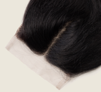 Close-up of the HD lace parting on a jet black body wave closure