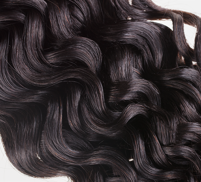 Overhead view of hair color swatches spread from the sample ring