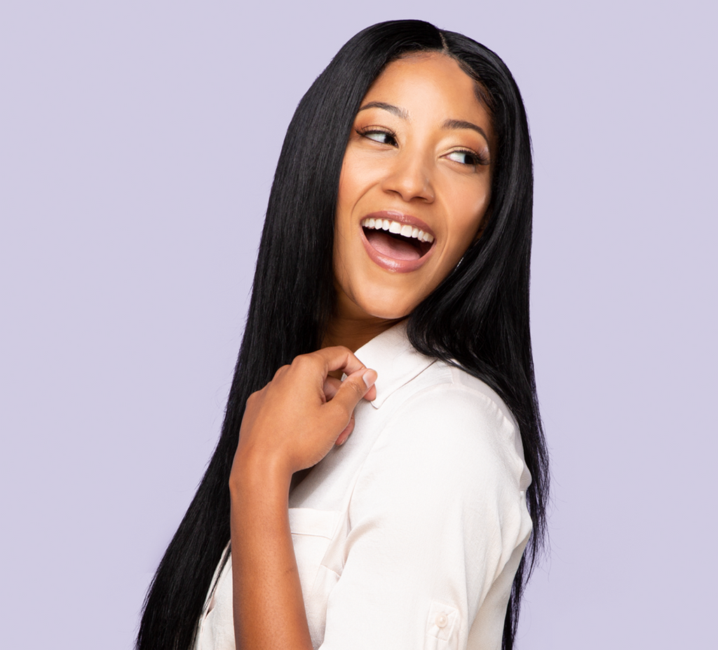 Model wearing a jet black straight 5x5 lace closure, front view