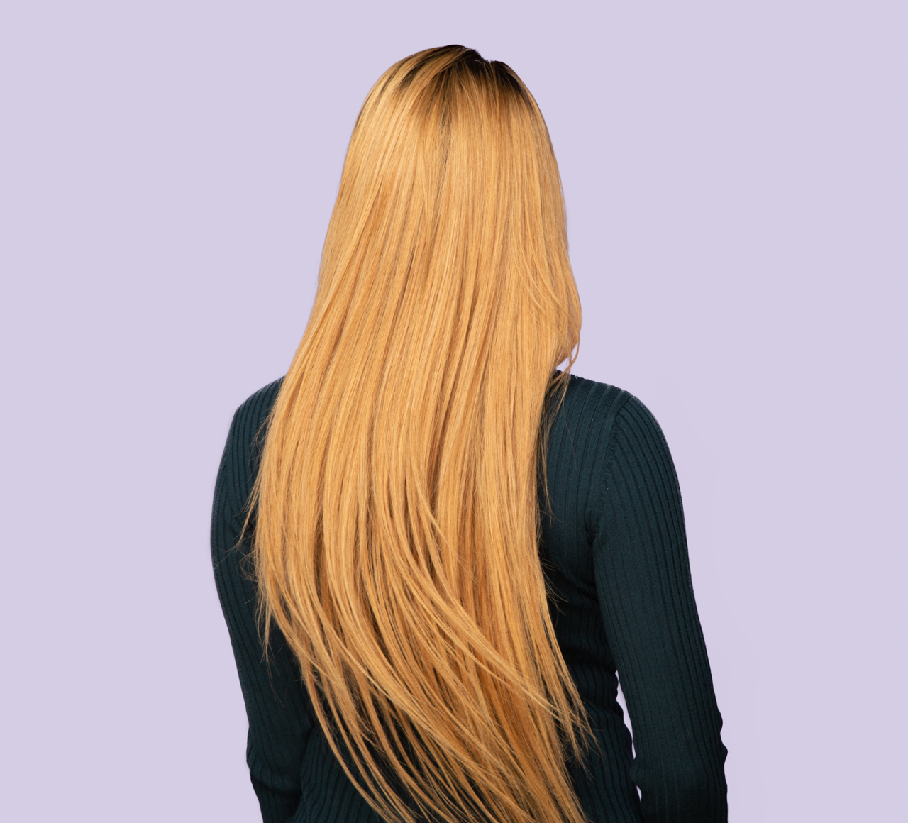 Model wearing a 1B/27 honey blonde Indian straight sew-in, front view