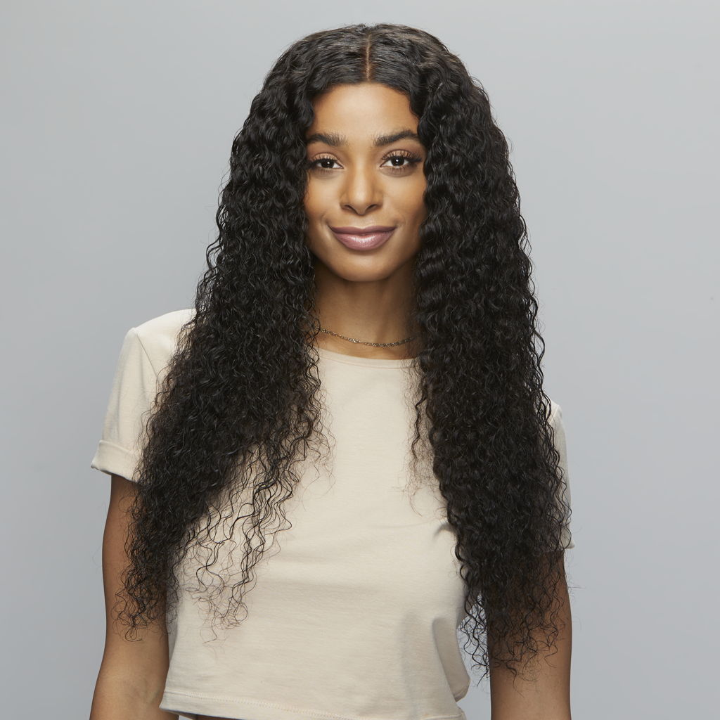 Close-up of HD lace blending into the hairline on a water wave closure