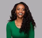 Model wearing a natural black Brazilian loose wave sew-in, front view