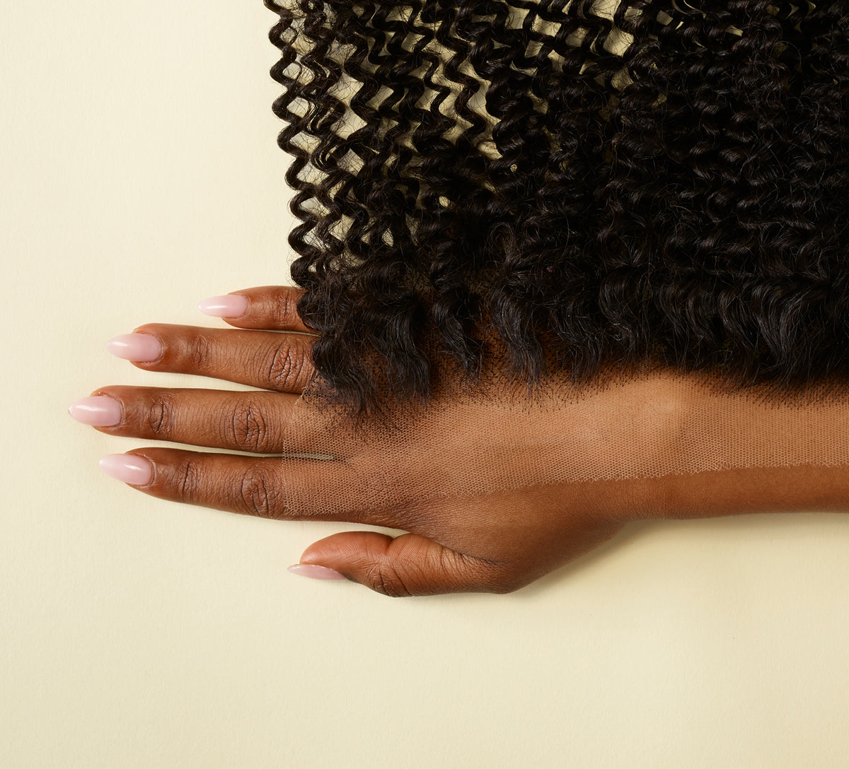 Color swatch of natural black virgin Brazilian curly frontal hair