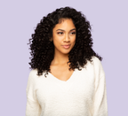 Model wearing a natural black Brazilian deep wave sew-in, front view