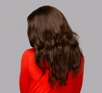 Close-up of the body wave pattern on chocolate brown virgin hair