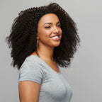 Back view of a Brazilian curly install finished with a lace frontal