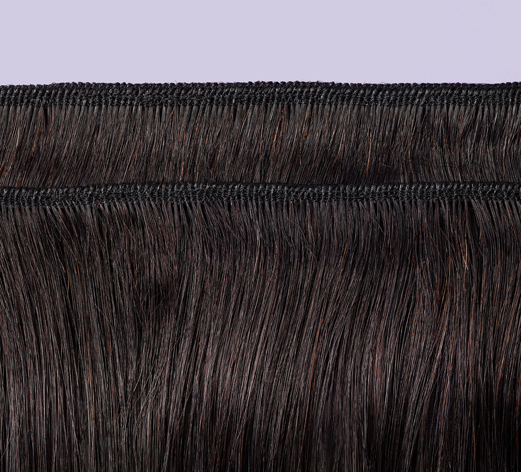 Side view of a natural black Brazilian water wave install past the shoulder