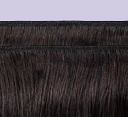 Side view of a natural black Brazilian water wave install past the shoulder
