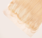 Close-up of transparent lace along a 613 blonde straight frontal hairline