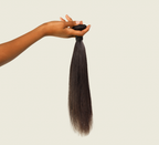Side view of natural black Brazilian straight bundles styled past the shoulder