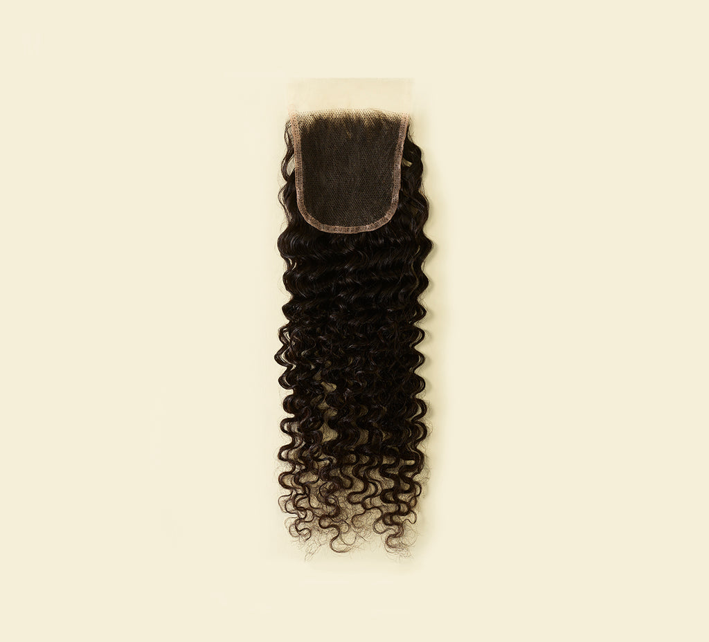 Color swatch of natural black virgin Brazilian deep wave HD closure hair