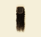 Color swatch of natural black virgin Brazilian deep wave HD closure hair