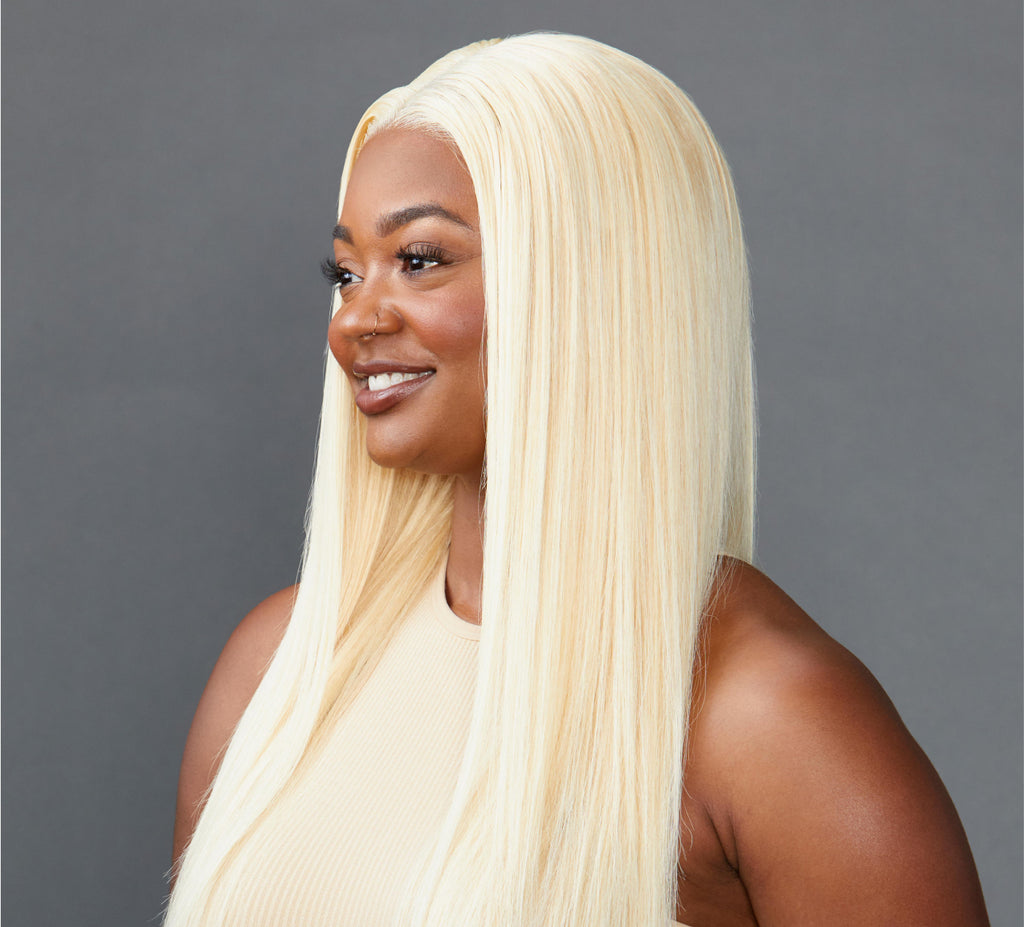 Model wearing a 613 blonde Indian straight 5x5 HD lace closure