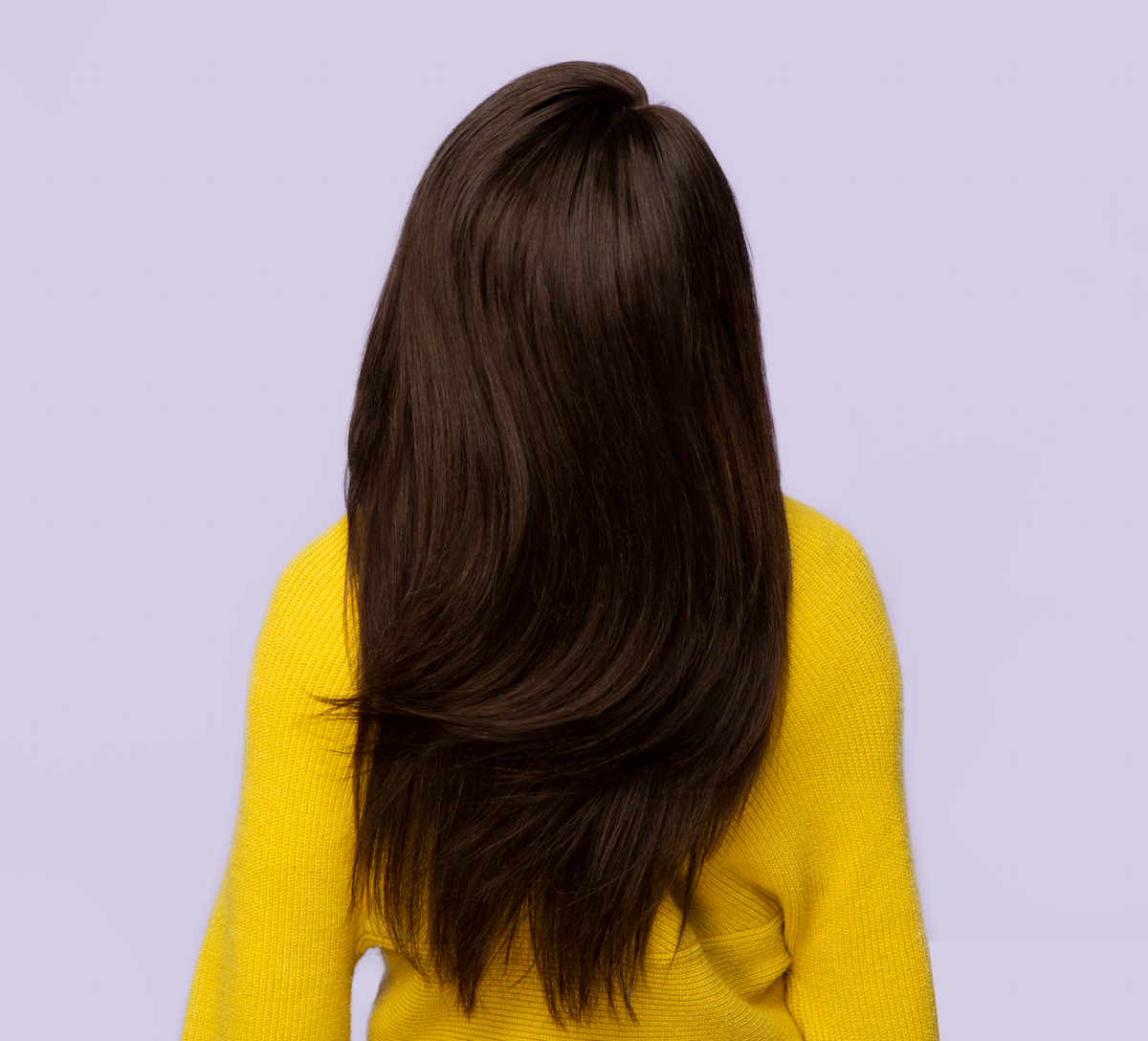 Model wearing a 2 chocolate brown straight sew-in, front view