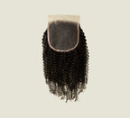 Color swatch of natural black virgin Brazilian curly 5x5 HD closure hair