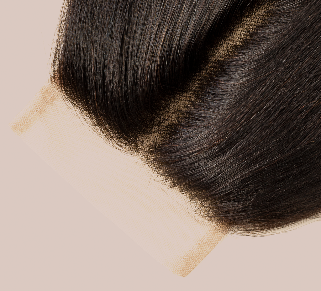 Close-up of the smooth yaki straight texture on a 4x4 lace closure