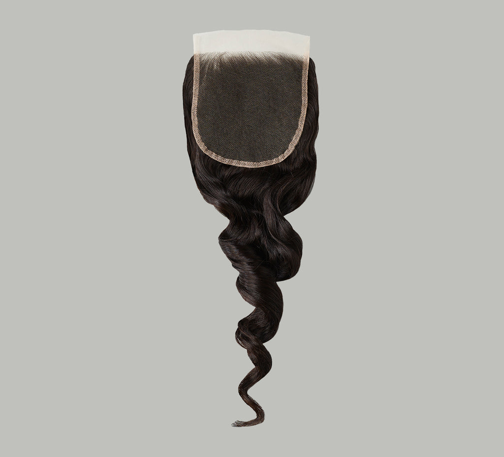 Color swatch of natural black virgin Brazilian loose wave closure hair