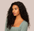 Model wearing a natural black water wave 4x4 lace closure, front view
