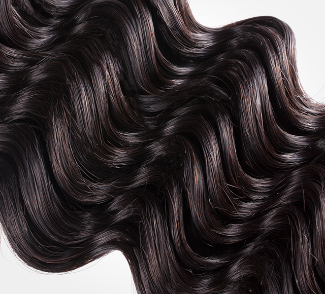 Detail of the sealed weft end on a hair sample ring swatch
