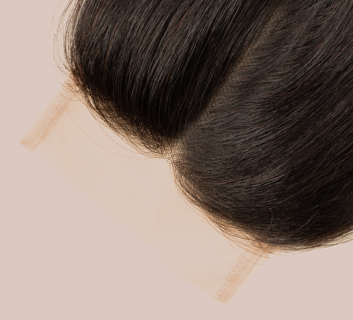 Close-up of the transparent lace parting space on a 4x4 straight closure
