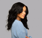 Close-up of the S-shaped body wave pattern on jet black virgin hair