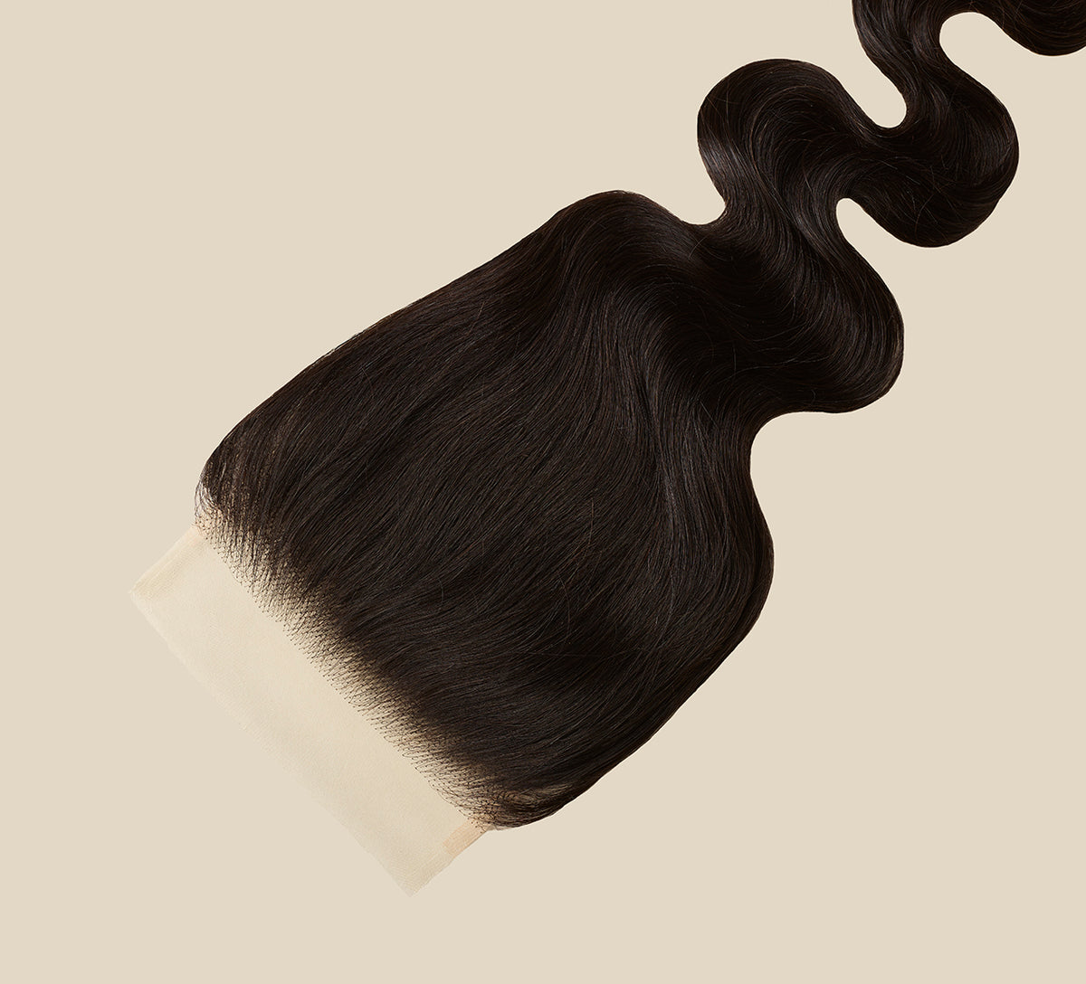 Natural black body wave 5x5 transparent lace closure laid flat on white