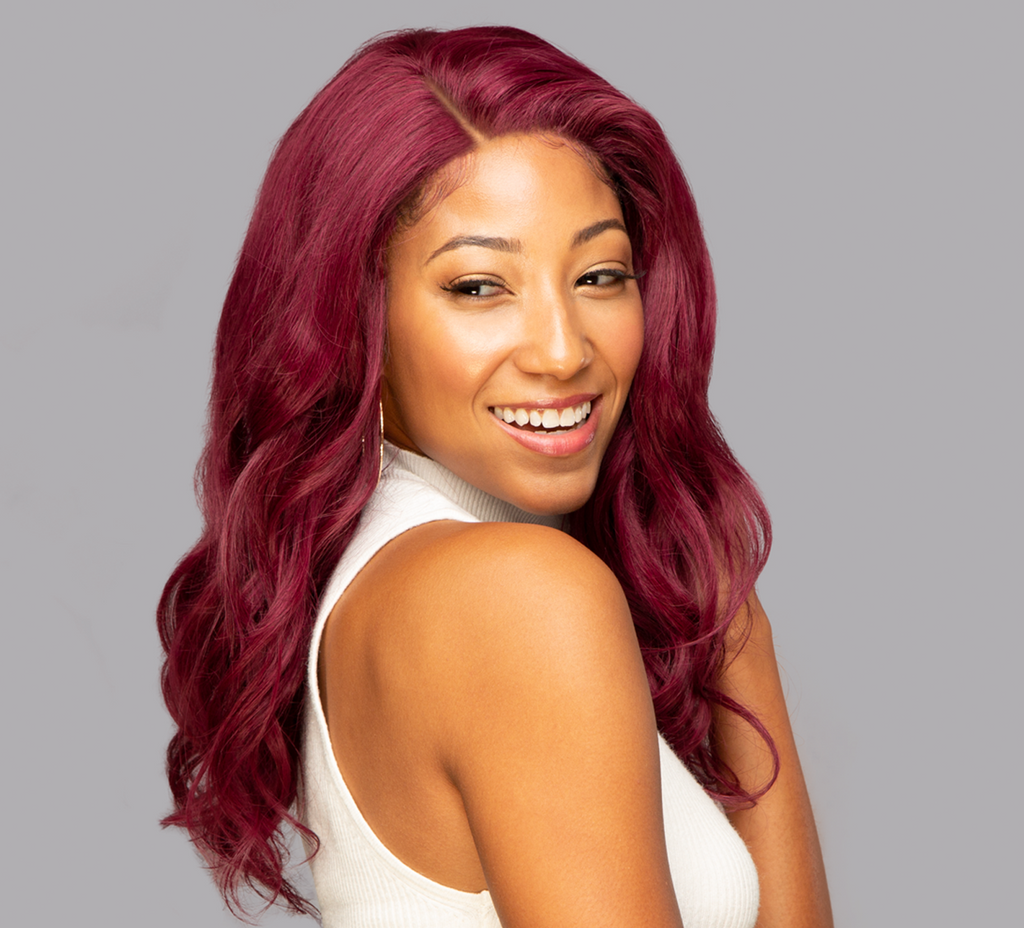 Model wearing a 99J burgundy body wave 5x5 HD lace closure