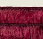 Side view of a burgundy body wave install past the shoulder