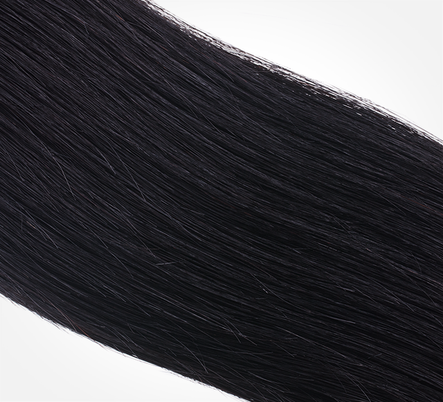Straight human hair swatch hanging from the stylist sample ring