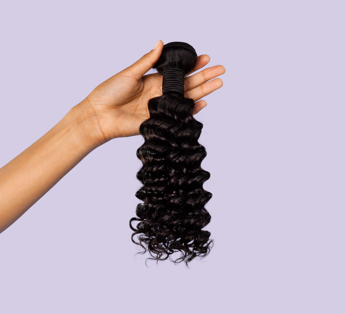 Side view of a natural black Brazilian deep wave install past the shoulder