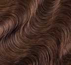 Chocolate brown body wave hair falling in soft waves down the back