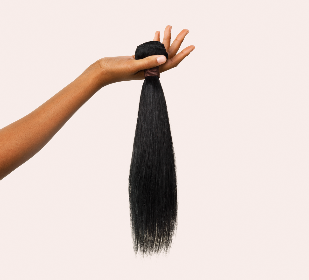 Close-up of the cuticle aligned strands on jet black straight hair