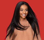 Side view of a natural black yaki straight install blended with natural hair