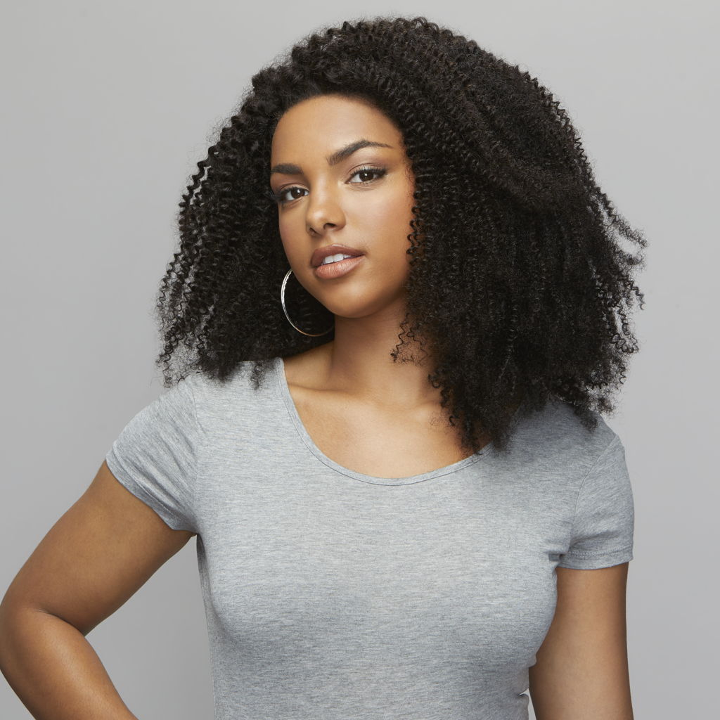 Close-up of the ear to ear HD lace on a curly frontal