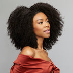 Back view of a Brazilian curly sew-in finished with an HD closure