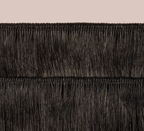 Side view of a jet black loose wave install past the shoulder