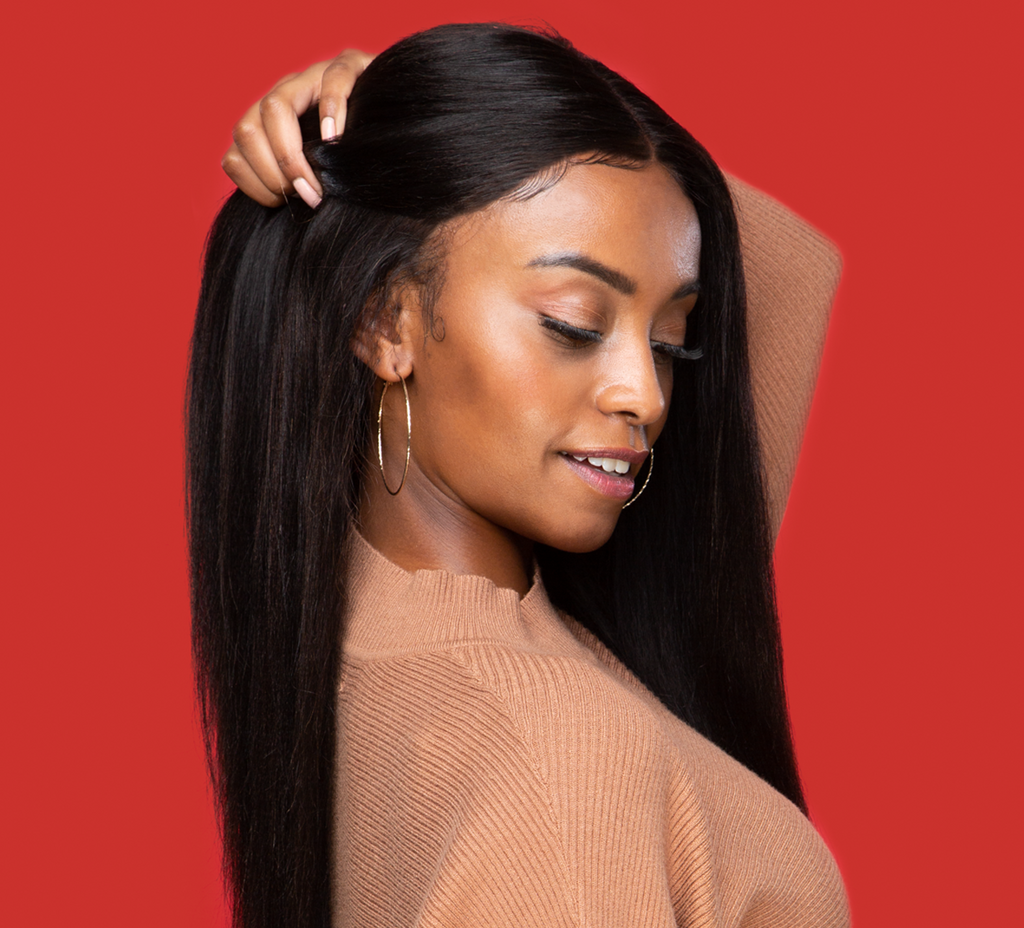 Model wearing a natural black yaki straight 13x4 transparent lace frontal