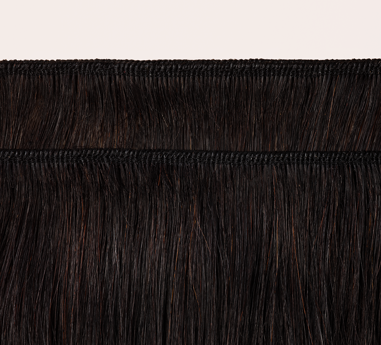 Back view of a Malaysian body wave sew-in showing bounce and movement
