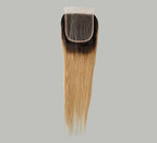 Color swatch of 1B/27 honey blonde Indian straight closure hair with dark roots